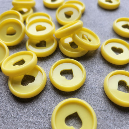 24mm plastic disc, yellow with heart