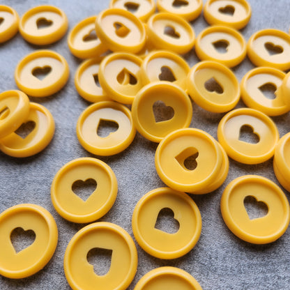 24mm plastic disc, orange with heart