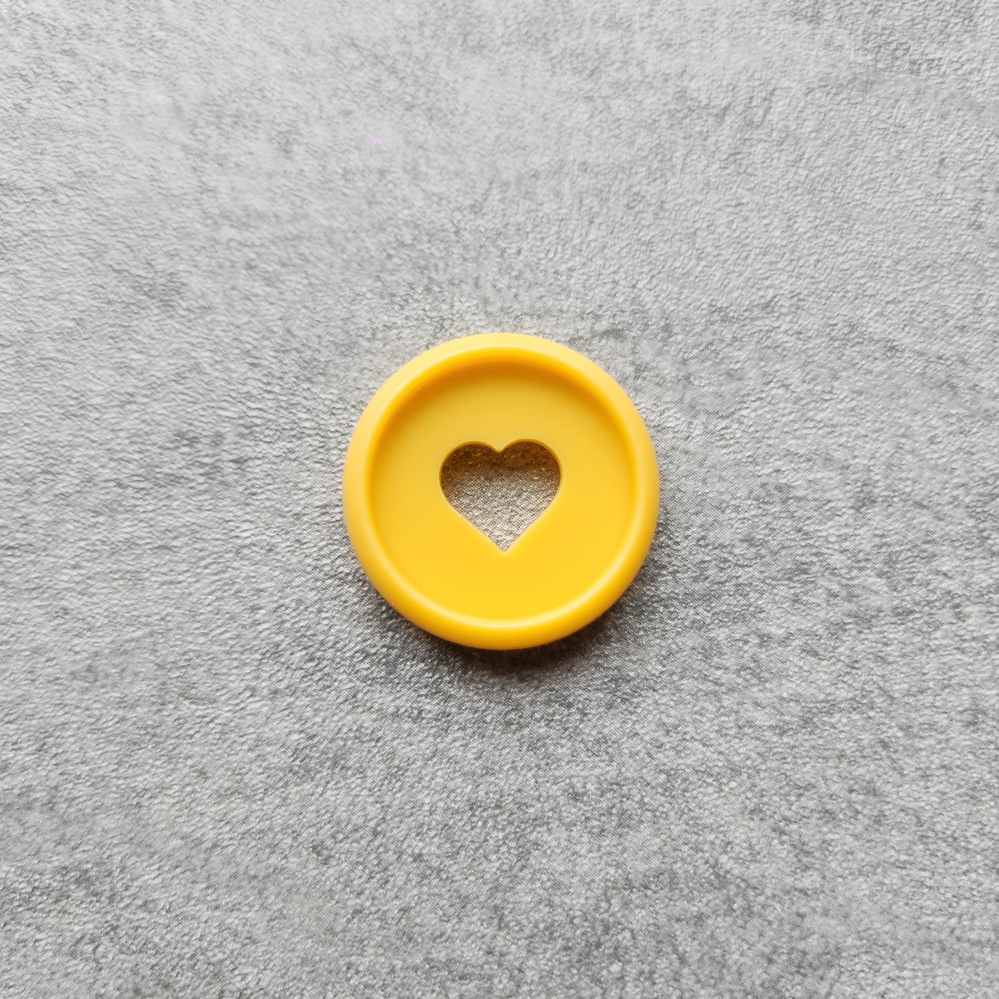 24mm plastic disc, orange with heart