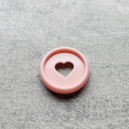 24mm plastic disc, pink with heart