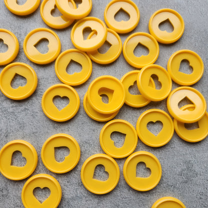 32mm plastic disc, orange with heart