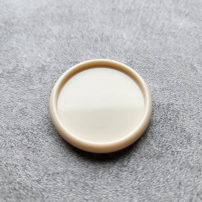 32mm plastic disc, off white