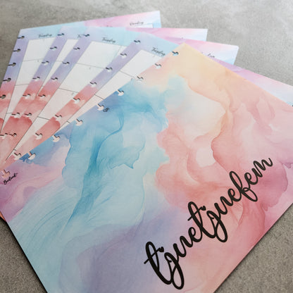 Pastel ink background with a monthly layout from Beilind 